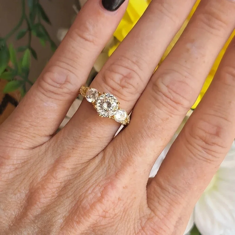 Genuine Moissanite Trilogy Ring In 14k YG Vermeil.